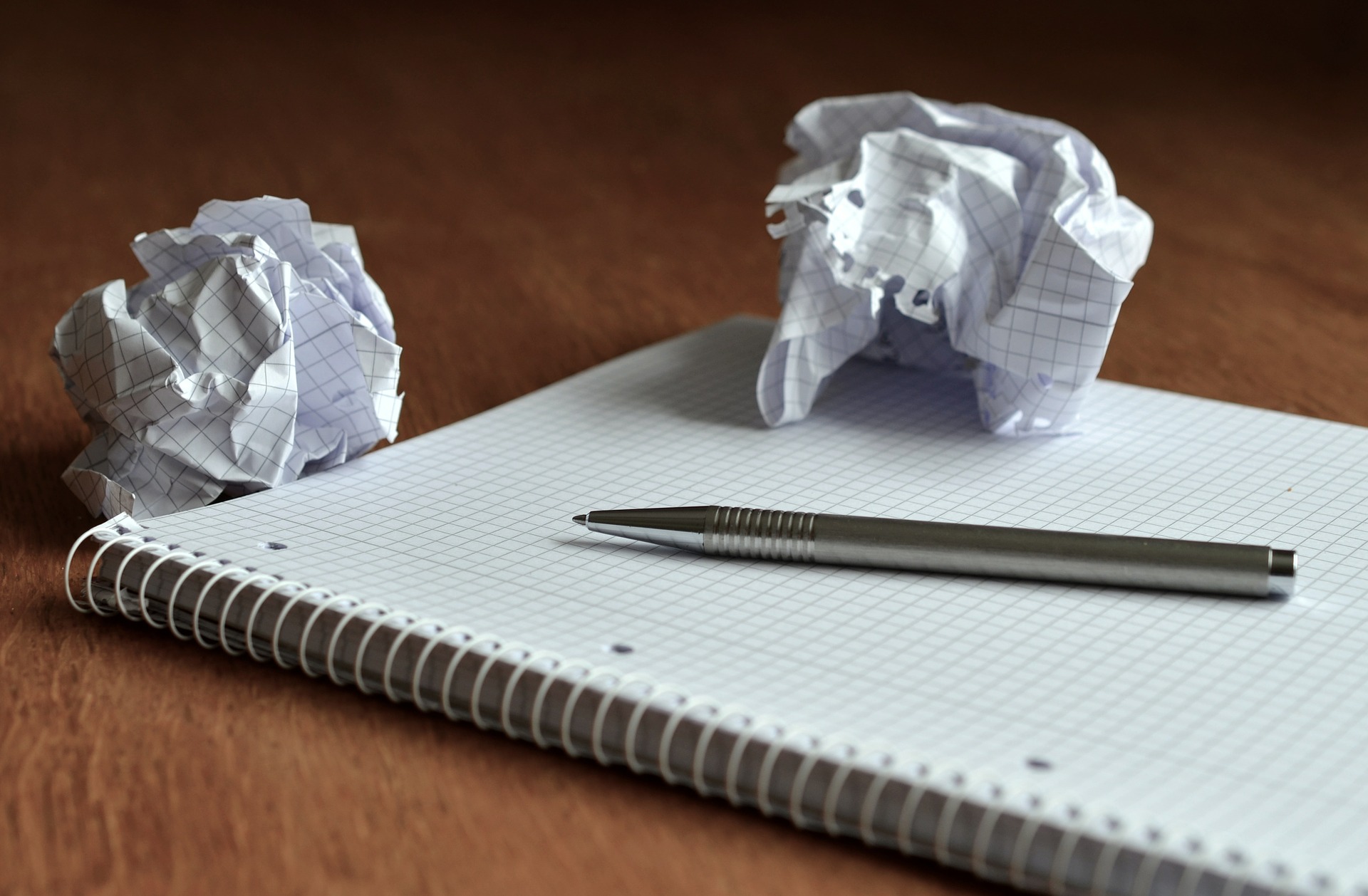Crumpled notes and pad